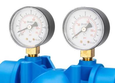 A pressure gauge on a high flow filter housing showing stable pressure