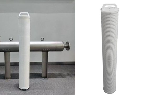 A Ecofiltrone high flow filter standing next to a 3M CUNO high flow filter, showing their identical size and shape