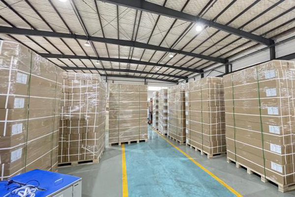 A warehouse with shelves of high-flow filter cartridges representing a safety stock strategy