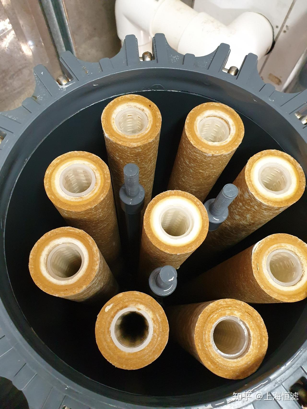 Clogged Conventional Filter Cartridge A clogged, conventional filter cartridge next to a clean one.