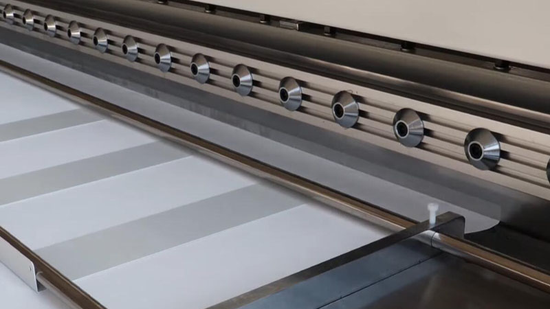 An animation or diagram showing a flat sheet of filter media being folded into a pleated cartridge