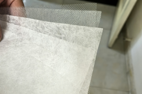 A close-up view of the gradient-density filter media structure.