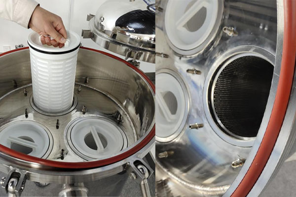 Worker easily replacing a horizontal high-flow filter cartridge