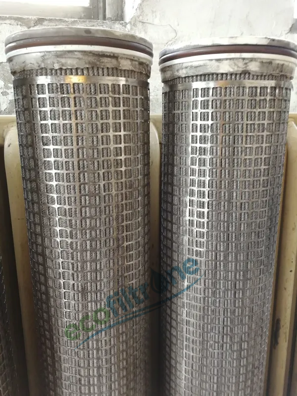 A pile of prematurely discarded filter cartridges next to a calendar