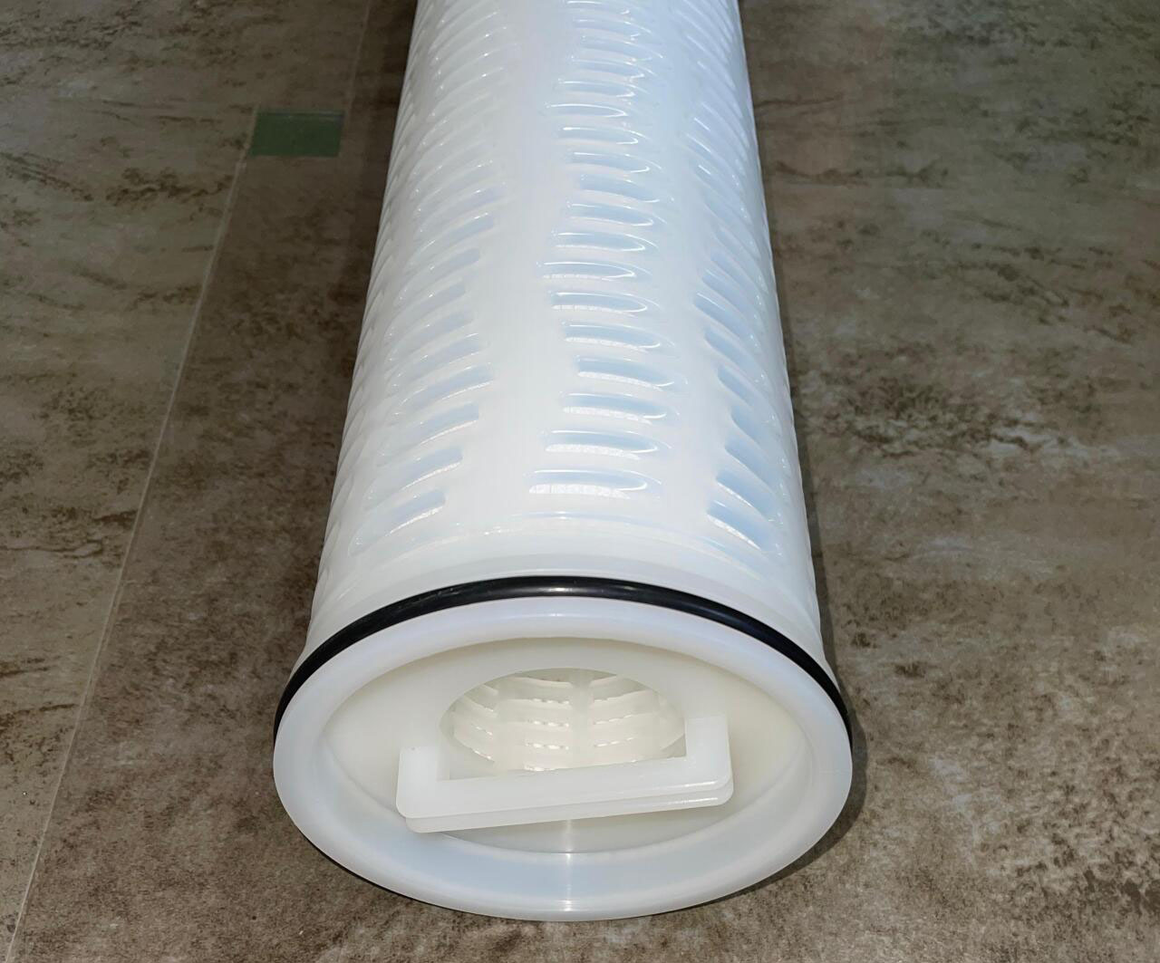 A high-flow filter cartridge failing prematurely in a water treatment system