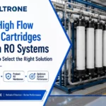 Large-diameter high flow filter cartridges inside an opened stainless stel filter housing at an RO plant